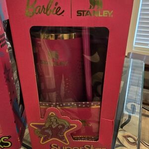 Stanley Pink Tumbler with Gold Accents and Matching Straw